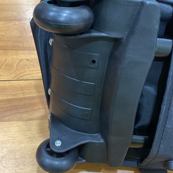 NWOT.  Nylon rolling carry-on bag. - Picture 4 of 13